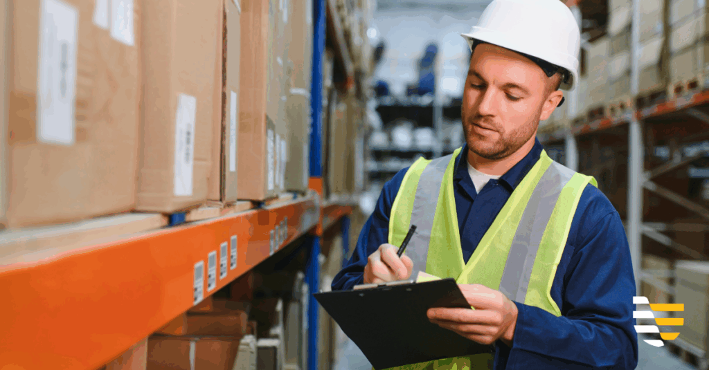 warehouse worker sorting hydraulic gauges